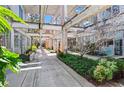 Exterior walkway with greenery and natural light creating a unique space at 659 Auburn Avenue Ne #219, Atlanta, GA 30312