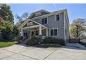 Two-story home with a well-manicured front yard and driveway, offering excellent curb appeal at 358 Southerland Ne Ter, Atlanta, GA 30307