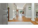 Inviting foyer boasts gleaming hardwood floors and neutral tones, creating a warm welcome to the home's interior at 730 Denmead Se Ml, Marietta, GA 30067