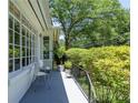 Inviting covered porch with seating, perfect for enjoying the outdoor scenery at 1920 W Forrest Ave, Atlanta, GA 30344
