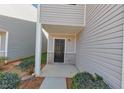 Close up of the entrance to a neutral sided townhome at 222 Alton Cir, Villa Rica, GA 30180