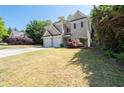 Two-story home with two-car garage and beautiful yard at 3986 Harmony Walk Se Way, Smyrna, GA 30082