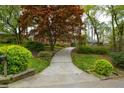 Charming brick home with landscaped yard and mature trees; idyllic suburban setting at 1245 Briar Hills Ne Dr, Atlanta, GA 30306