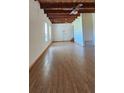 Expansive living area showcasing hardwood floors and natural light from large windows at 1406 High Sierra Dr, Lawrenceville, GA 30043