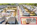 Aerial view of the neighborhood and surrounding area, including a dog park and parking at 6210 Bellmoore Park Ln, Duluth, GA 30097