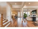 Spacious living room with hardwood floors, fireplace, and an open floor plan at 6210 Bellmoore Park Ln, Duluth, GA 30097