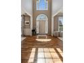 Inviting foyer with hardwood floors, high ceilings, and abundant natural light at 4249 Millside Walk, Smyrna, GA 30080