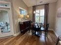 Cozy breakfast nook with hardwood floors and a view to the outside at 2702 Wollerton St # 2702, Cumming, GA 30040
