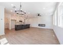 Bright and airy living room with wood floors, modern fireplace, and open floor plan at 1600 Ruskin Way, Marietta, GA 30062