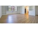 Sunlit living room with built-in bookshelves and hardwood floors at 2965 Pharr Court South Nw # 503, Atlanta, GA 30305