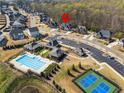 Gorgeous aerial view of neighborhood amenities and the home at 3515 Montebello Pkwy, Cumming, GA 30028