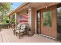 Inviting front porch with seating, perfect for enjoying a relaxing morning or evening at 2720 Cold Springs Sw Trl, Marietta, GA 30064