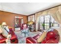 Comfortable living room with hardwood floors and plenty of natural light at 2720 Cold Springs Sw Trl, Marietta, GA 30064