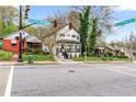 Street view capturing a two-story house at the corner of Martin Luther King Jr. and Morris Brown Dr. SW with street signs at 1115 Martin Luther King Jr Sw Dr, Atlanta, GA 30314