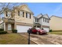 Charming two-story house with brick accents and private driveway at 6389 Shadow Sq, Lithonia, GA 30058