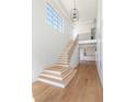 Bright entryway with staircase and open floor plan at 504 Barrington Dr, Roswell, GA 30075