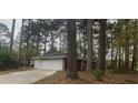 Spacious garage connected to the house via an attached structure at 3488 Richmond Se Dr, Conyers, GA 30094