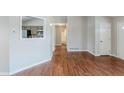 Living room view showcasing laminate floors, fresh paint, and open layout at 167 Fairview Oak Trl, Dallas, GA 30157