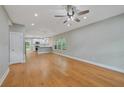 Open-concept living room featuring hardwood floors and access to the kitchen at 1857 Derrill Dr, Decatur, GA 30032