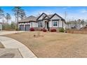 Scenic view of a home with a well-kept lawn and professional landscaping, showcasing its curb appeal at 114 Montgomery Ln, Villa Rica, GA 30180