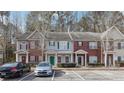 Townhouse exteriors with reserved parking spaces in a well maintained community at 20 Pine Canyon Sw Dr # 26, Atlanta, GA 30331