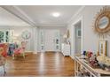 Inviting foyer showcases hardwood floors, elegant decor, and ample natural light at 2925 Arden Nw Rd, Atlanta, GA 30305