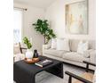 Bright living room features neutral furniture, modern decor, and stylish accents at 91 Chester Se Aly, Atlanta, GA 30316
