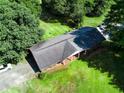 An aerial view of the roof and landscaping around the house at 684 N Cherokee N Rd, Social Circle, GA 30025