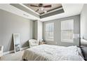 Large main bedroom with neutral paint, carpet, a ceiling fan and 2 windows for lots of light at 325 E Paces Ferry Ne Rd # 810, Atlanta, GA 30305