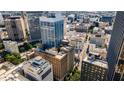 Aerial cityscape of urban towers and roads in downtown Atlanta at 32 Peachtree Nw St # 1303, Atlanta, GA 30303