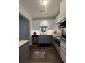 Modern kitchen featuring stainless steel appliances, sleek countertops, and stylish cabinets for an elegant and functional space at 400 17Th Nw St # 2031, Atlanta, GA 30363
