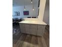 Kitchen island with gray cabinets and white countertops at 400 17Th Nw St # 2031, Atlanta, GA 30363