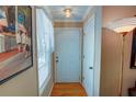 Entryway featuring hardwood floors and neutral paint tones at 1005 Berkeley Woods Dr, Duluth, GA 30096