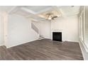 Bright living room showcasing wood floors, a fireplace, and decorative ceilings at 2789 Aralynn Way, College Park, GA 30337