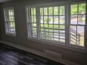Bedroom windows showcase natural light and views to the front yard at 1956 Shirley Sw St, Atlanta, GA 30311