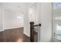 Bright entryway with hardwood floors and views of the dining area and powder room at 2026 Manchester Ne St, Atlanta, GA 30324