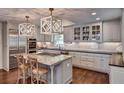 Spacious kitchen featuring granite countertops, an island cooktop, and stainless steel appliances at 3776 N Stratford Ne Rd, Atlanta, GA 30342