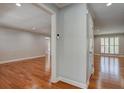 Spacious living area with hardwood floors, neutral paint, and recessed lighting at 1840 Linwood Ave, Atlanta, GA 30344