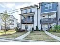 Charming two-story townhomes feature private balconies and well-maintained landscaping at 2225 Nena Way, Tucker, GA 30084