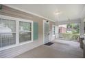 Relaxing front porch with a swing, perfect for enjoying the outdoors at 972 Sims Nw Ave, Atlanta, GA 30318