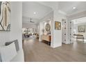 Grand foyer with light hardwood floors, decor, an open floor plan, and plenty of natural light at 103 Candler Loop, Acworth, GA 30101