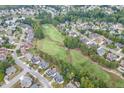 Aerial view showcasing the neighborhood, golf course, and the property's prime location at 1718 Autumn Sage Dr, Dacula, GA 30019