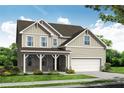Charming two-story home with neutral siding, a cozy front porch, and an attached two-car garage at 363 Riverwood Pass, Dallas, GA 30157