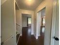 Bright entryway showing wood floors and staircase at 920 James Nw Ct, Marietta, GA 30060