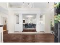 Elegant foyer featuring dark wood floors and views into the dining room at 2675 Misty Morning Ln, Roswell, GA 30076