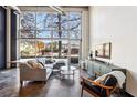 Inviting living space with large windows and comfortable seating arrangement at 5200 Peachtree Rd # 1111, Atlanta, GA 30341