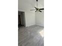Spacious bedroom featuring a ceiling fan and new flooring at 2575 Picardy N Cir # B, Atlanta, GA 30349