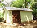 Outbuilding with rustic star on a wood door at 1908 Bouldercrest Se Rd, Atlanta, GA 30316