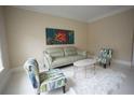 A cozy sitting room filled with comfortable seating and stylish decor, enhancing the room's elegance at 1191 Crofton Landing, Suwanee, GA 30024
