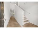 Bright entryway features wood-look flooring and leads to the staircase and other rooms at 321 Daybreak Dr, Acworth, GA 30102